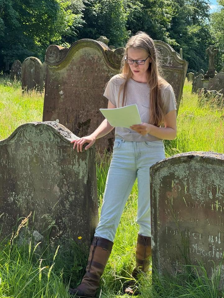 Brittany Warren presenting the history of a grave during a Brampton Old Church tour